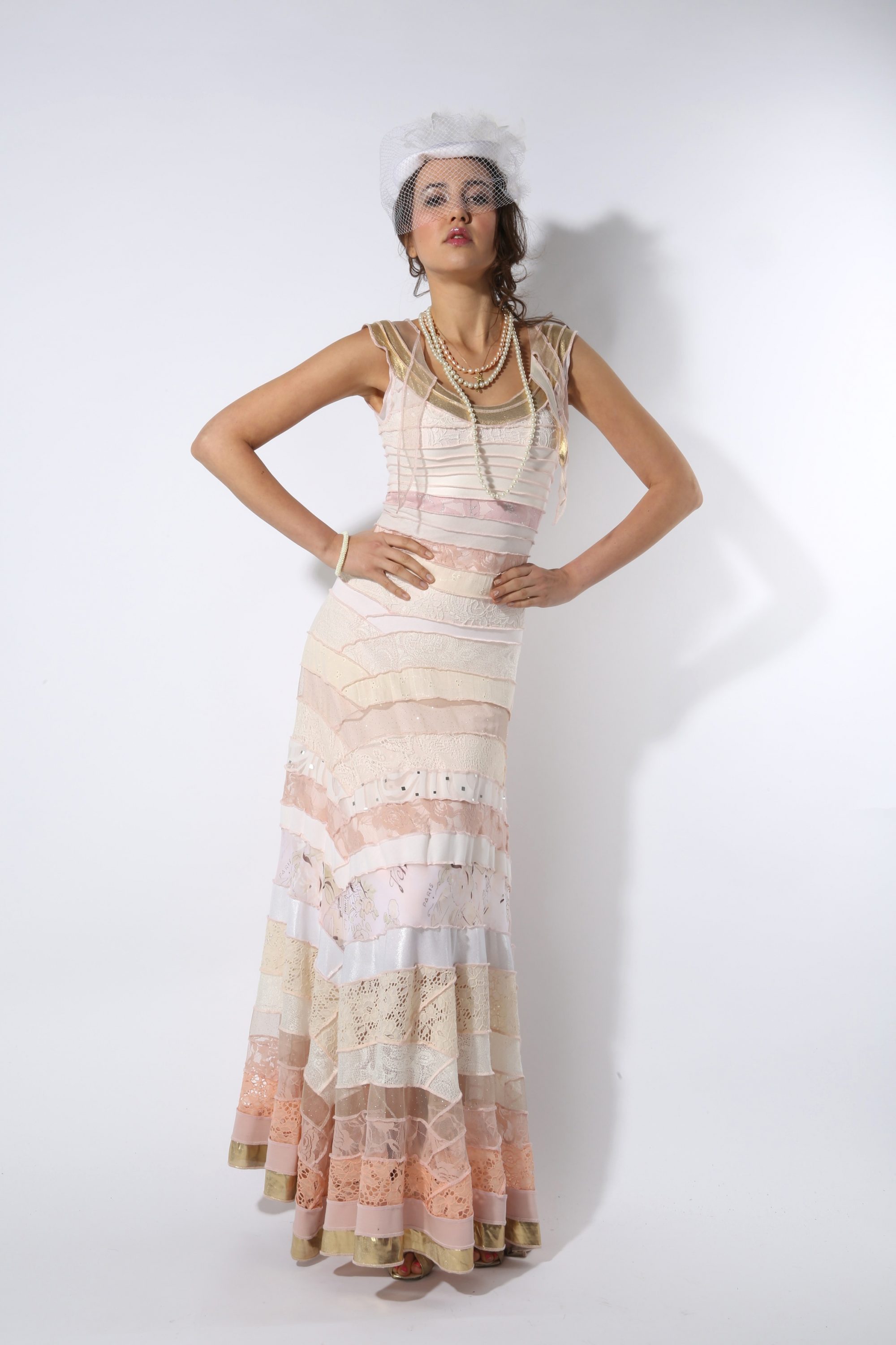 Selma Karaca writes, "Any material that can be sewn together in ribbon forms gives me a continuously-unending direction in between time and space to create art in wearable pieces that links between the inner and outer world in an energetic aesthetic. I have been working with this spiral concept to bring attention to the primordial need of art to collaborate with the human body. I search for an infinite beauty and detail in these spiral works that find their form in the bodies that wear them. Every piece I create has the very basic symbol of stillness and fluidity." Beacon, NY 12508