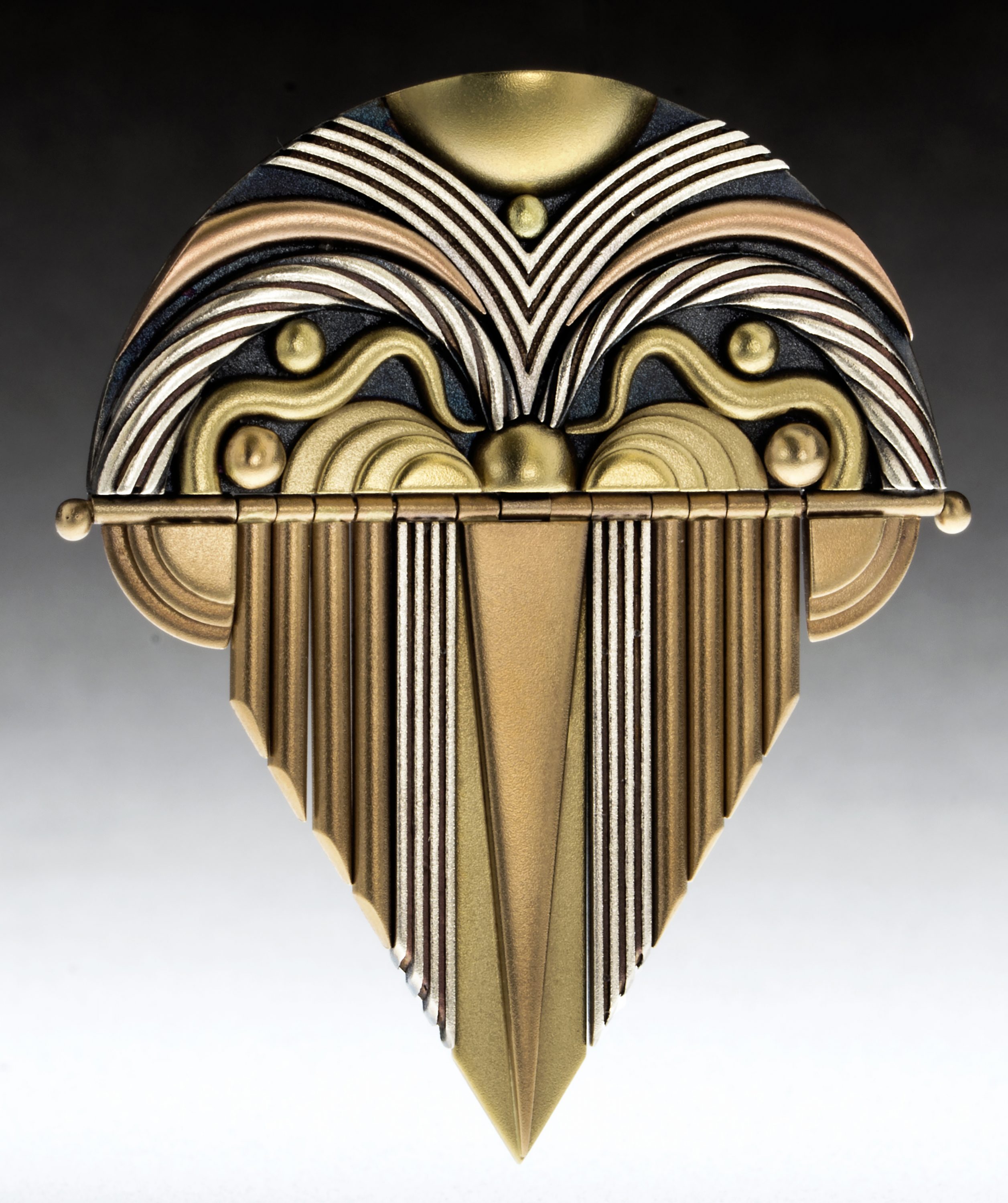 Aaron Macsai actually alloys his own gold, which allows him to create more colors than the standard yellow, white and pink. Intricately carved, Mascai’s ebullient bracelets, brooches, pendants and earrings are recognized for their integrity of design. His work was selected for the prestigious national touring exhibition “The Art of Gold”. "Fountain Pin"