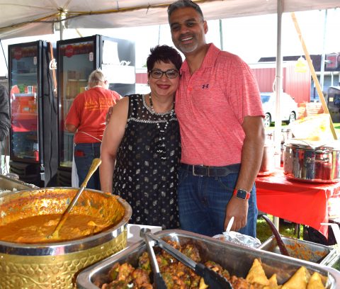 Mother and son Alka and Amit Kanoujia have one of the most popular restaurants in the Festival Dining Tent at Paradise City. They serve authentic Indian recipes, like coconut curry shrimp, vegetable pakoras and iced mango lassi.